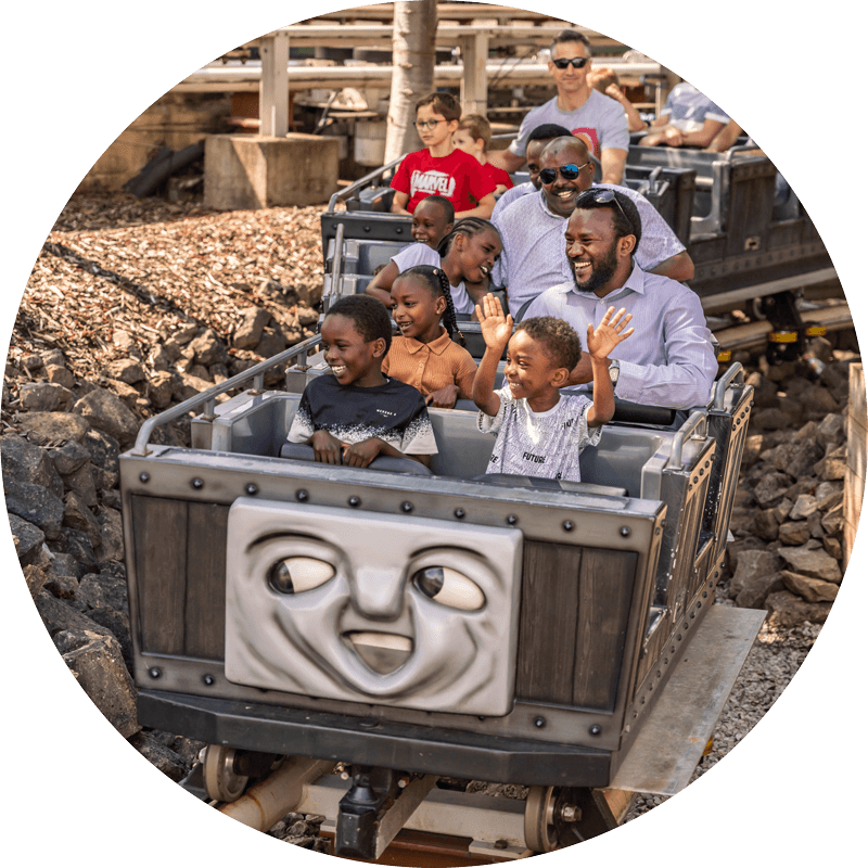 Family riding Troublesome Trucks